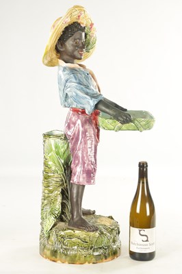 Lot 58 - A LARGE EARLY 20TH CENTURY MAJOLICA FIGURAL SCULPTOR