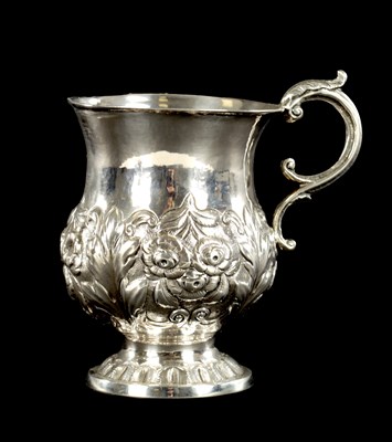 Lot 413 - AN IRISH FLORAL EMBOSSED SILVER CHRISTENING MUG