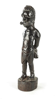 Lot 921 - A 20TH CENTURY AFRICAN CARVED EBONY FIGURE OF A SLAVE