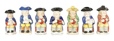 Lot 116 - A COLLECTION OF SEVEN 19TH CENTURY PRATT STYLE TOBY JUGS