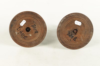 Lot 913 - A PAIR OF 19TH CENTURY TURNED WALNUT TREENWARE CANDLESTICKS