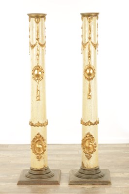 Lot 1265 - A PAIR OF 19TH CENTURY CONTINENTAL POLYCHROME AND GILDED WOODEN TORCHERE STANDS