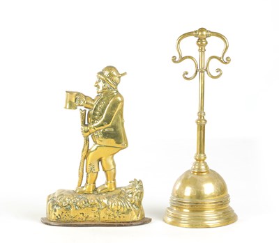 Lot 716 - TWO 19TH CENTURY BRASS DOORSTOPS