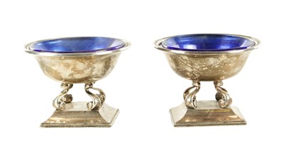 Lot 443 - A PAIR OF SILVER SALT CELLARS WITH BLUE GLASS LINERS