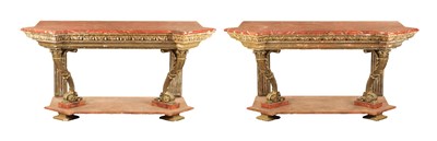 Lot 1256 - A STYLISH PAIR OF CARVED GILTWOOD AND SCUMBLED MARBLE CONSOLE TABLES