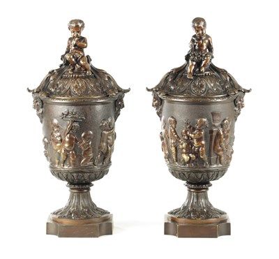 Lot 634 - AFTER CLODIAN. A PAIR OF LATE 19TH CENTURY BRONZE LIDDED URNS