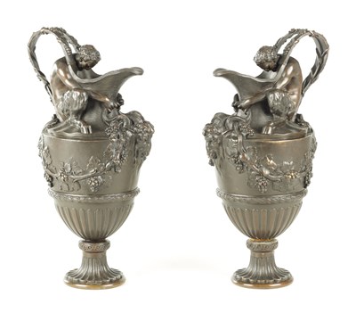 Lot 661 - A PAIR OF LATE 19TH CENTURY BRONZE EWERS OF CLASSICAL FORM