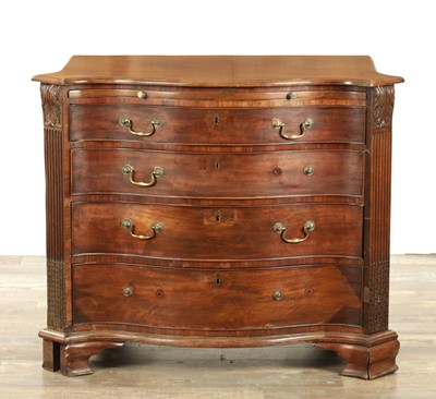 Lot 1312 - A GEORGE III MAHOGANY SERPENTINE CHEST OF DRAWERS