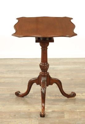 Lot 1349 - A GEORGE III MAHOGANY SERPENTINE TILT TOP TABLE