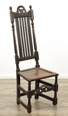 Lot 1383 - A CHARLES II OAK HALL CHAIR