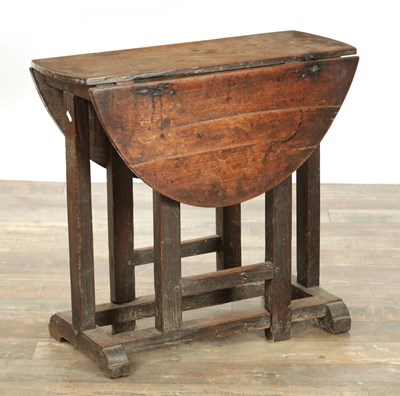 Lot 1324 - A 17TH CENTURY WALNUT GATE LEG TABLE OF SMALL SIZE