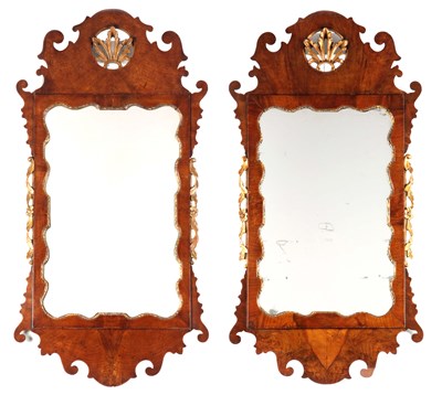 Lot 1409 - A PAIR OF GEORGE II WALNUT AND GILTWOOD HANGING MIRRORS