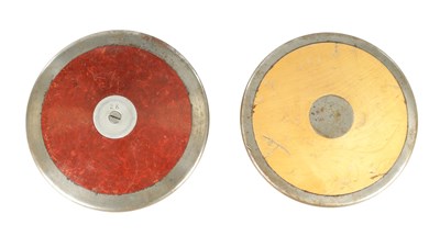 Lot 787 - TWO VINTAGE WOOD AND STEEL THROWING DISCUSS