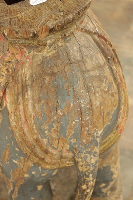 Lot 222 - A LARGE PAIR OF 19TH CENTURY INDIAN CARVED POLYCHROME PAINTED SCULPTURES OF ELEPHANTS