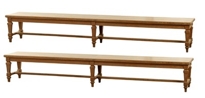 Lot 1223 - A PAIR OF LARGE OAK HALL BENCHES IN THE MANNER OF HOLLAND AND SON