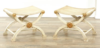 Lot 1275 - A DECORATIVE PAIR OF REGENCY STYLE PAINTED STOOLS