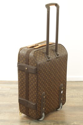 Lot 879 - A GENUINE LOUIS VUITTON SUITCASE