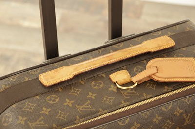 Lot 879 - A GENUINE LOUIS VUITTON SUITCASE