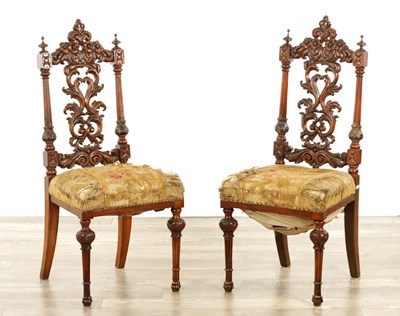 Lot 1360 - A PAIR OF 19TH CENTURY CARVED WALNUT SIDE CHAIRS