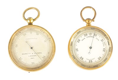Lot 394 - TWO GILT BRASS CASED POCKET BAROMETERS