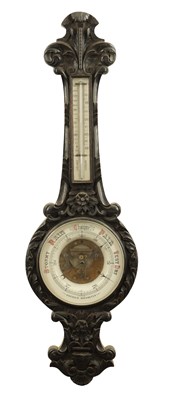 Lot 1133 - A LARGE LATE 19TH CENTURY CARVED OAK ANEROID BAROMETER