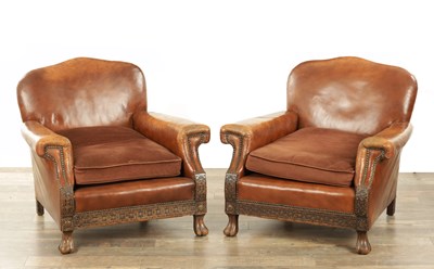 Lot 1376 - A PAIR OF EDWARDIAN OAK AND TAN LEATHER UPHOLSTERED ARMCHAIRS