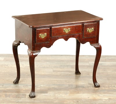 Lot 1393 - A GEORGE II OAK LOWBOY
