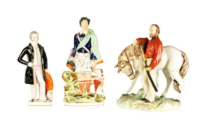 Lot 114 - THREE 19TH CENTURY STAFFORDSHIRE FIGURES