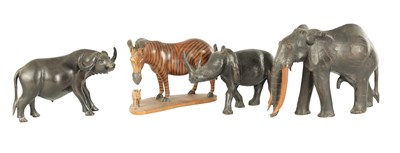Lot 685 - A COLLECTION OF CARVED AFRICAN ANIMALS