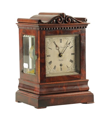 Lot 1056 - JAMES BANNISTER, LONDON. A MID 19TH CENTURY FIGURED MAHOGANY LIBRARY CLOCK