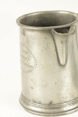 Lot 963 - AN ARTS AND CRAFTS PEWTER EWER