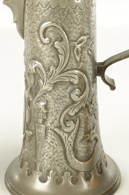 Lot 963 - AN ARTS AND CRAFTS PEWTER EWER