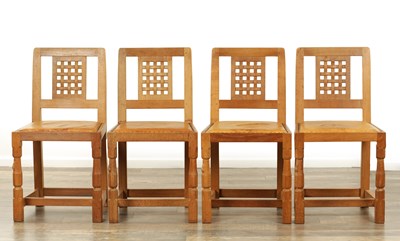 Lot 1259 - A SET OF FOUR ROBERT ‘MOUSEMAN’ THOMPSON AZED OAK LATTICE BACK DINING CHAIRS