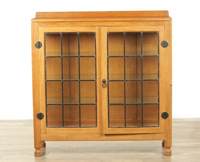 Lot 1357 - AN UNUSUAL ROBERT ‘MOUSEMAN’ THOMPSON JOINED ADZED LIGHT OAK SIDE CABINET