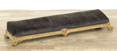 Lot 1261 - A 19TH CENTURY CARVED GILT WOOD LONG FOOT STOOL