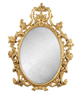 Lot 1295 - A GEORGE III CARVED GILT WOOD HANGING MIRROR
