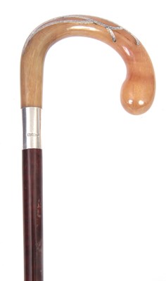 Lot 492 - A 19TH CENTURY MAHOGANY AND SILVER INLAID RHINO HORN WALKING STICK
