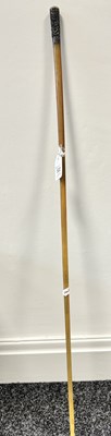 Lot 605 - A 19TH CENTURY CHINESE SILVER MOUNTED RHINOCEROS HORN RIDING CROP