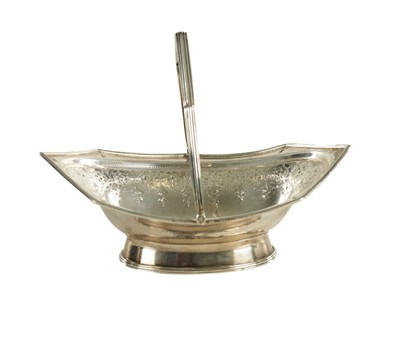 Lot 404 - A GEORGE III SILVER SWEETMEAT BASKET