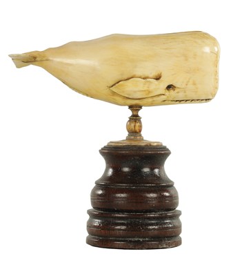 Lot 759 - A 19TH CENTURY SCRIMSHAW-CARVED MARINE IVORY SCULPTURE MODELLED AS A SPERM WHALE