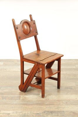 Lot 1347 - AN ARTS AND CRAFTS WALNUT METAMORPHIC LIBRARY CHAIR / STEPS