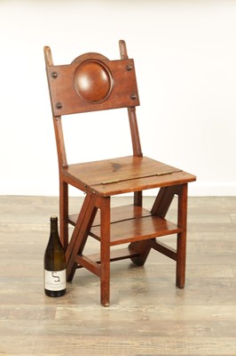 Lot 1347 - AN ARTS AND CRAFTS WALNUT METAMORPHIC LIBRARY CHAIR / STEPS