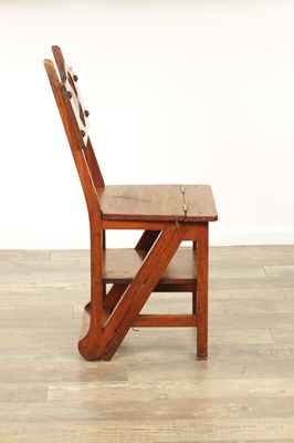 Lot 1347 - AN ARTS AND CRAFTS WALNUT METAMORPHIC LIBRARY CHAIR / STEPS