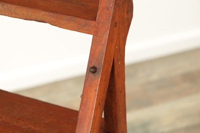 Lot 1347 - AN ARTS AND CRAFTS WALNUT METAMORPHIC LIBRARY CHAIR / STEPS