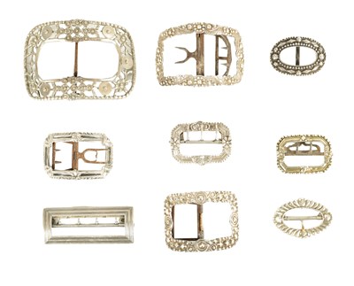 Lot 412 - A COLLECTION OF NINE 19TH CENTURY SILVER AND SILVER METAL BELT BUCKLES