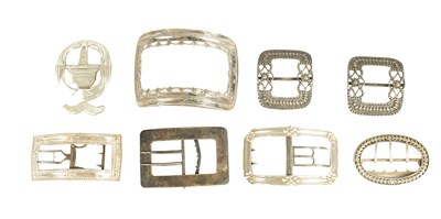 Lot 457 - A COLLECTION OF EIGHT 19TH CENTURY SILVER AND SILVER METAL BELT BUCKLES