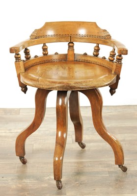 Lot 1231 - AN UNUSUAL LATE 19TH CENTURY AESTHETIC PERIOD ELM REVOLVING DESK CHAIR