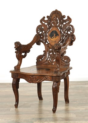 Lot 1272 - A 19TH CENTURY CARVED WALNUT AND MARQUETRY INLAID BLACK FOREST ARMCHAIR