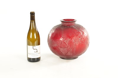 Lot 35 - A RENE LALIQUE CASE CHERRY RED AND AMBER GLASS 'POISSONS' GLOBULAR VASE