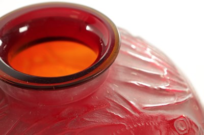 Lot 35 - A RENE LALIQUE CASE CHERRY RED AND AMBER GLASS 'POISSONS' GLOBULAR VASE